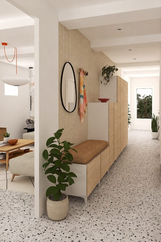 Vue 3D de l’entrée avec banquette, rangements sur mesure en bois clair, tapisserie moutarde ethnique, miroir ovale et sol en terrazzo.
