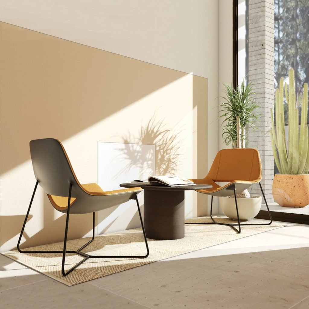 Coin lecture baigné de lumière naturelle avec fauteuils design noir et camel