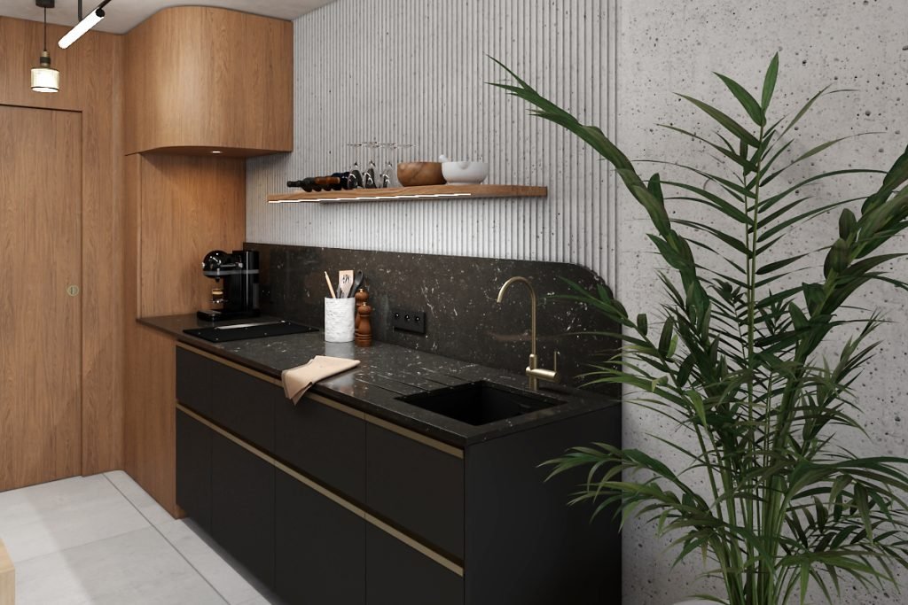 Cuisine masculine compacte aux façades noires avec plan de travail en quartz noir, meubles en bois et robinetterie en laiton.