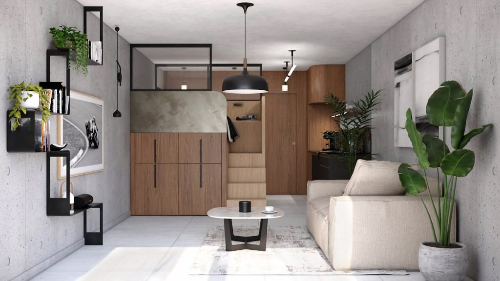 Espace de vie d’un studio à l’ambiance masculine, avec cube multifonction en bois et noir, canapé clair et murs effet béton.