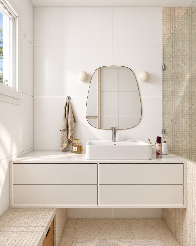 Meuble vasque blanc suspendu avec miroir arrondi dans une salle d’eau lumineuse et chaleureuse.